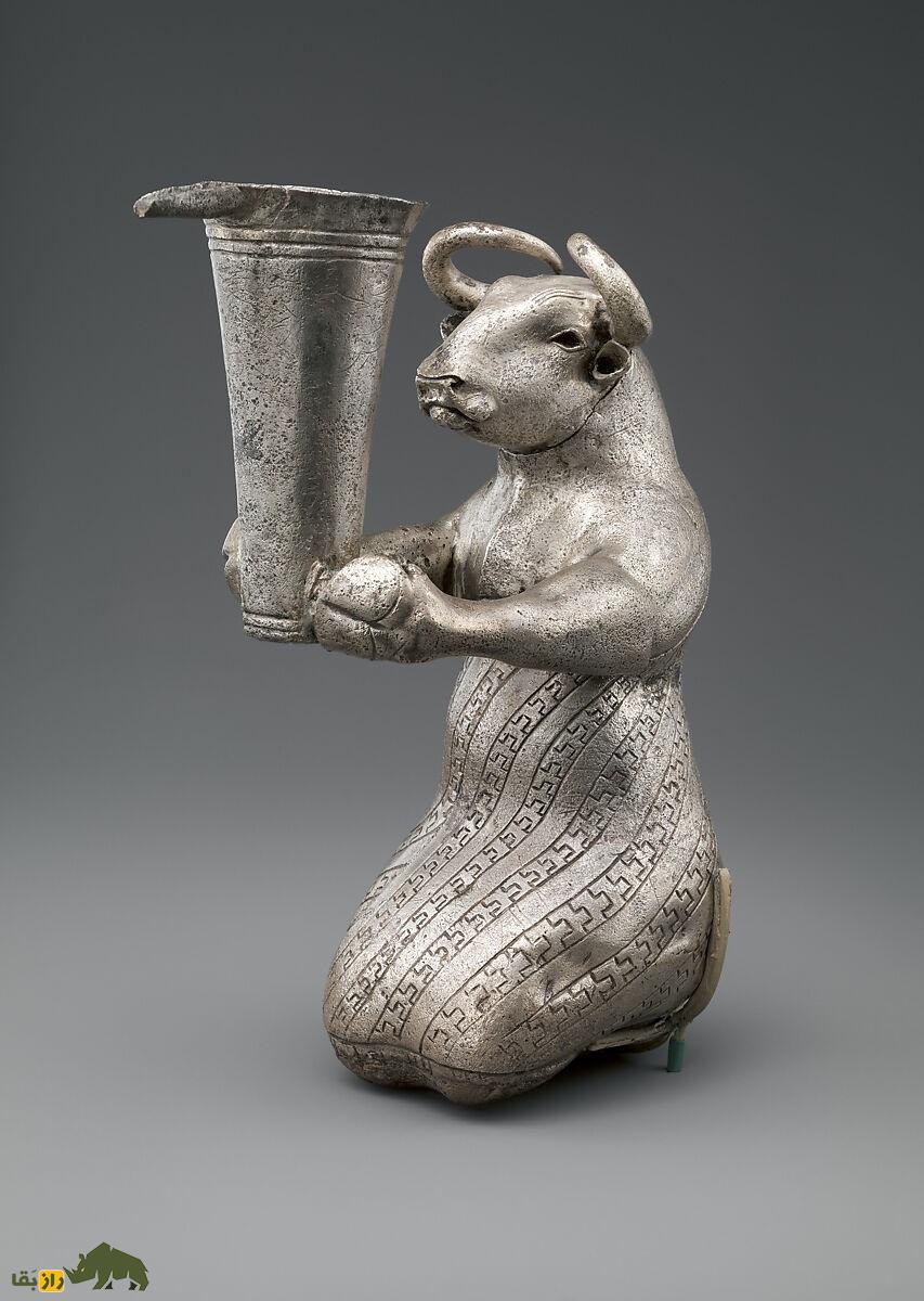 گاو زانوزده با ظرف دهانهدار؛ عتیقهای مرموز از تمدن ایلام با ظاهر انسان و حیوان و ۳۰۰۰ سال قدمت که در شوش کشف شد و به نیویورک رفت گاو زانوزده با ظرف دهانهدار