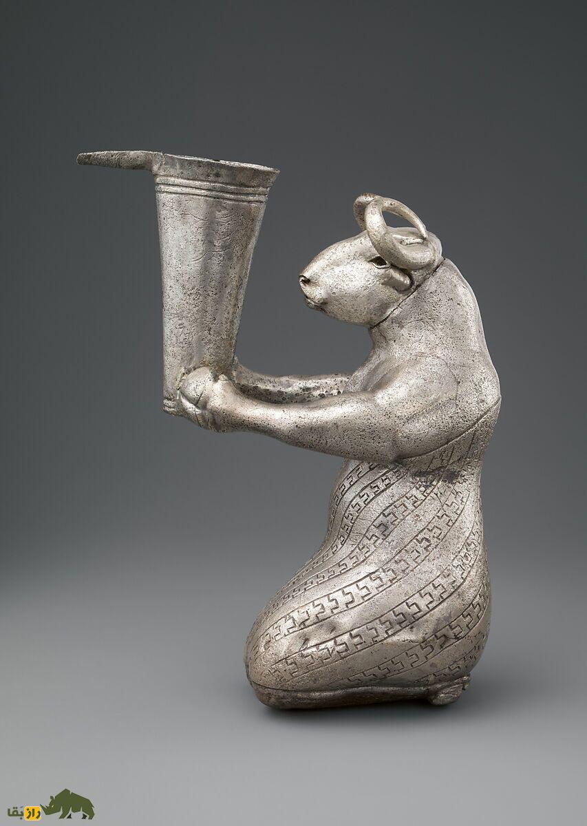 گاو زانوزده با ظرف دهانهدار؛ عتیقهای مرموز از تمدن ایلام با ظاهر انسان و حیوان و ۳۰۰۰ سال قدمت که در شوش کشف شد و به نیویورک رفت گاو زانوزده با ظرف دهانهدار